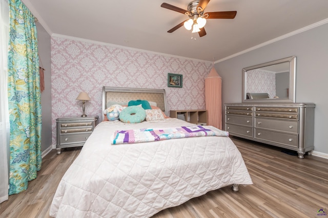 826 Edward Pl, Macon, GA 31204 - bedroom with wallpapered walls, crown molding, wood finished floors, baseboards, and ceiling fan