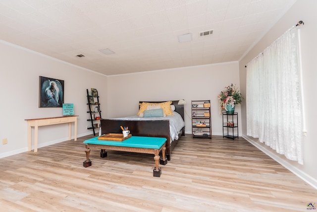 826 Edward Pl, Macon, GA 31204 - bedroom with ornamental molding, wood finished floors, and baseboards