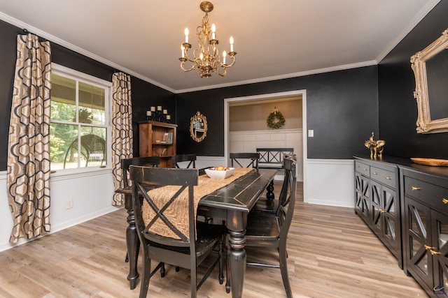 826 Edward Pl, Macon, GA 31204 - dining space featuring a chandelier, light wood finished floors, ornamental molding, wainscoting, and baseboards