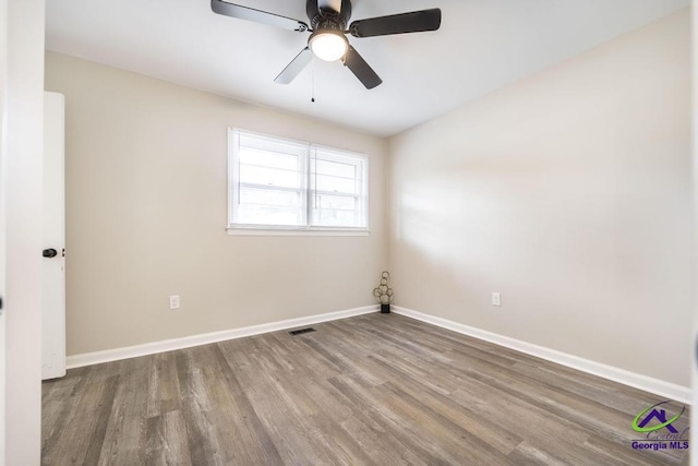 123 Robinhood Dr, Warner Robins, GA 31088 - unfurnished room featuring wood finished floors, baseboards, and ceiling fan
