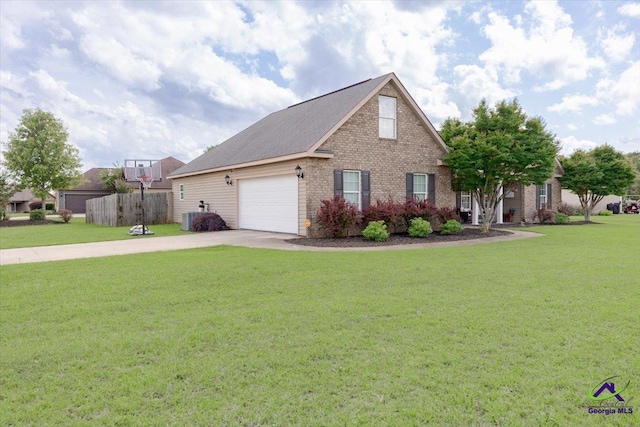 133 Gage Dr, Perry, GA 31069 - traditional-style house featuring concrete driveway, brick siding, and an attached garage