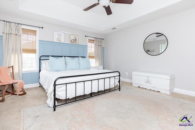 133 Gage Dr, Perry, GA 31069 - bedroom with baseboards, carpet, and a raised ceiling