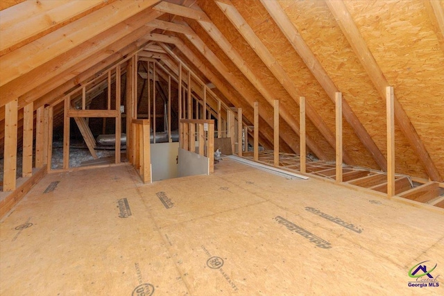 133 Gage Dr, Perry, GA 31069 - attic featuring an upstairs landing