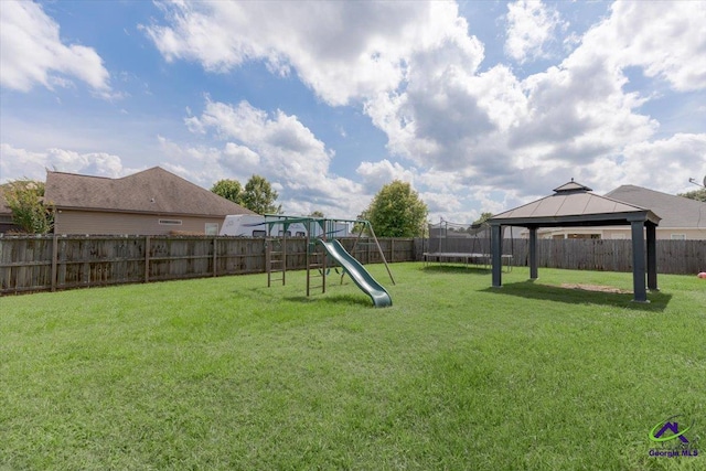 133 Gage Dr, Perry, GA 31069 - view of yard with a trampoline, a gazebo, and a playground