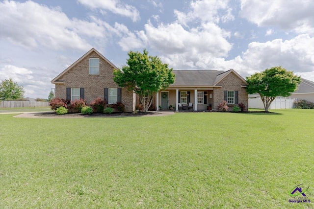 133 Gage Dr, Perry, GA 31069 - view of front of property featuring brick siding and a porch