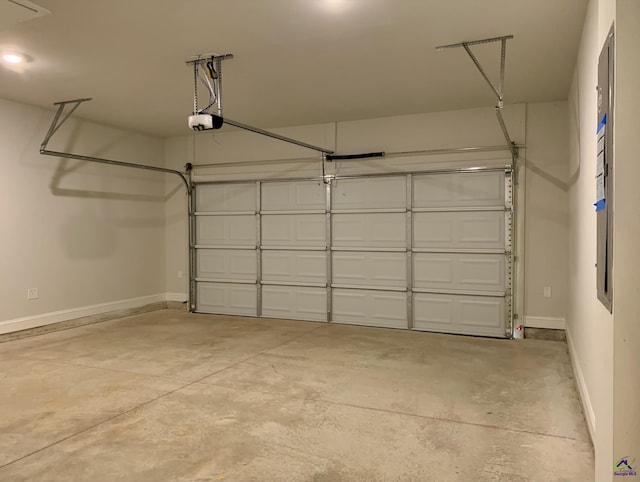 1146 Barrington Pl, Way, Macon, GA 31220 - garage featuring a garage door opener and baseboards
