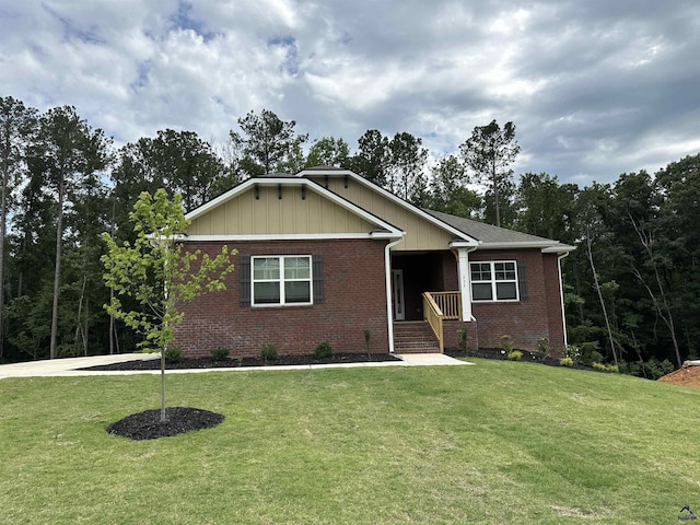 233 Carsons Walk, Macon, GA 31216 - view of front of house featuring brick siding and a front yard
