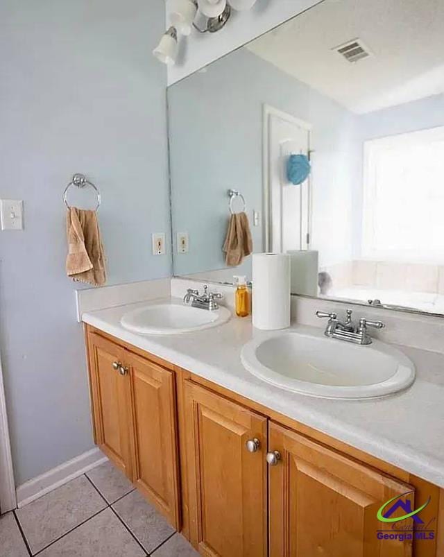 108 Christine, Perry, GA 31069 - bathroom with double vanity and tile patterned floors