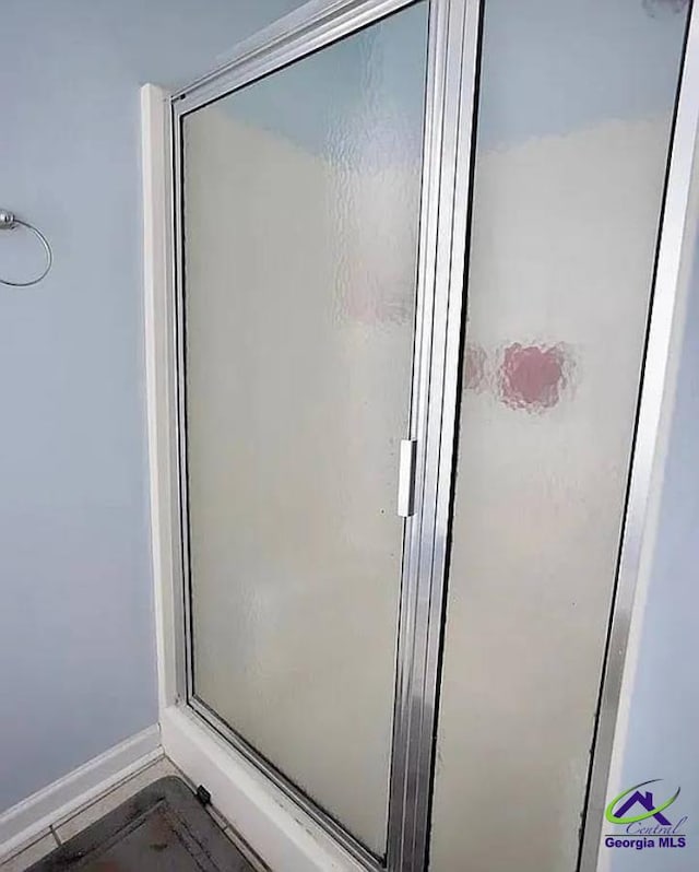 108 Christine, Perry, GA 31069 - full bath featuring a stall shower and baseboards