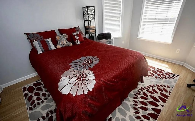 108 Christine, Perry, GA 31069 - bedroom featuring wood finished floors and baseboards