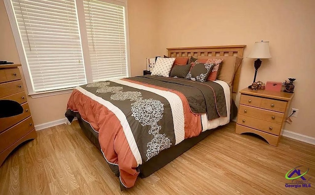 108 Christine, Perry, GA 31069 - bedroom with light wood finished floors and baseboards