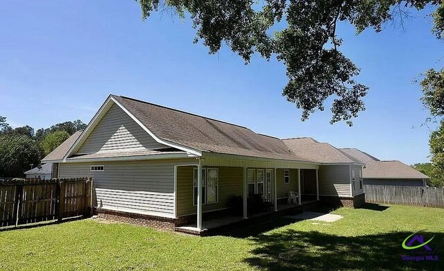 108 Christine, Perry, GA 31069 - back of house with a patio area