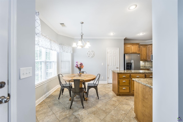 307 George Francis Ct, Bonaire, GA 31005 - dining space featuring ornamental molding, baseboards, a chandelier, and recessed lighting