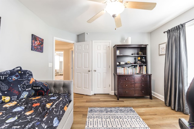 307 George Francis Ct, Bonaire, GA 31005 - bedroom with wood finished floors and ceiling fan