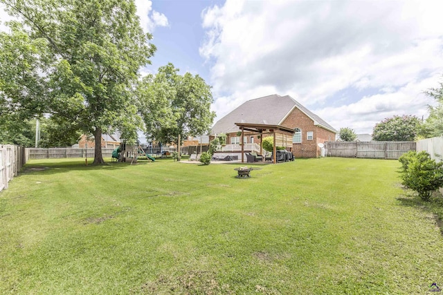 307 George Francis Ct, Bonaire, GA 31005 - view of yard with a playground and a fire pit