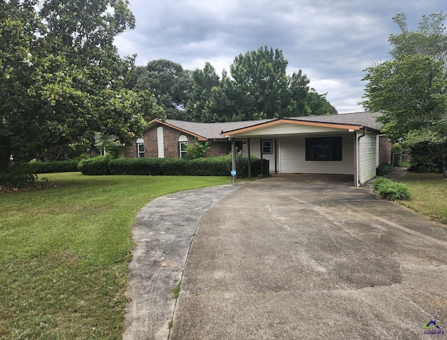 122 Cheryl Blvd, Warner Robins, GA 31088 - ranch-style home featuring concrete driveway, a front yard, and an attached carport