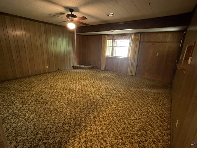 122 Cheryl Blvd, Warner Robins, GA 31088 - empty room with wood walls and a ceiling fan