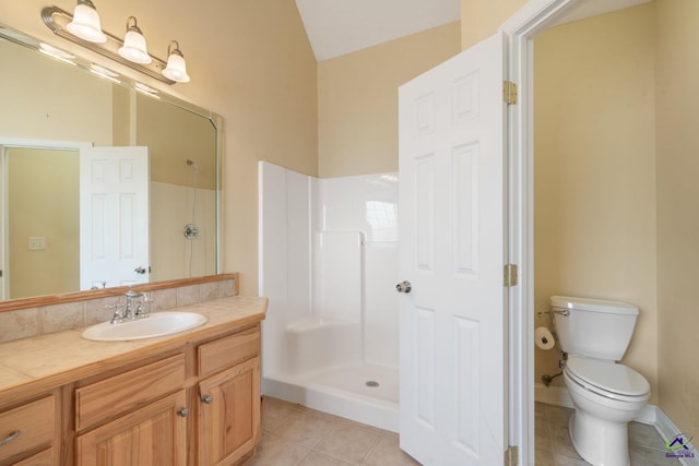 107 Rachael Ln, Warner Robins, GA 31088 - bathroom featuring a walk in shower, vanity, and tile patterned flooring