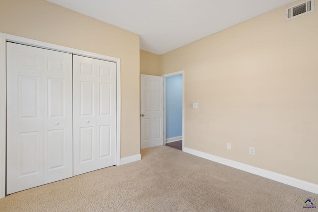 107 Rachael Ln, Warner Robins, GA 31088 - unfurnished bedroom featuring carpet and a closet