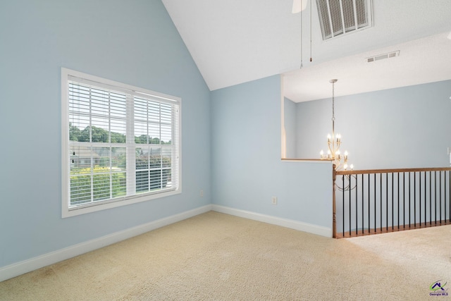 107 Rachael Ln, Warner Robins, GA 31088 - carpeted spare room with a chandelier and lofted ceiling
