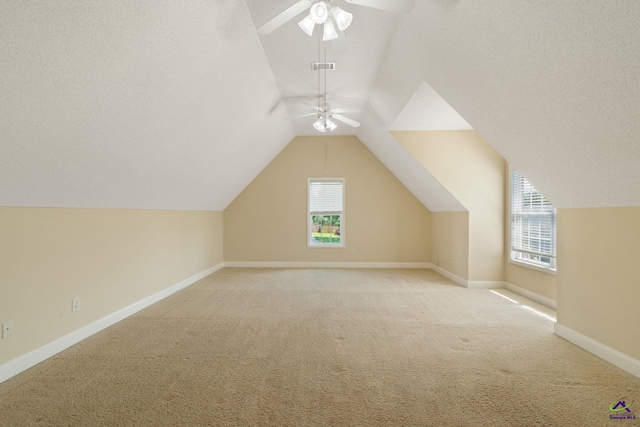 107 Rachael Ln, Warner Robins, GA 31088 - bonus room featuring ceiling fan, light carpet, and vaulted ceiling