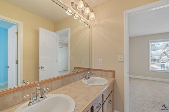 107 Rachael Ln, Warner Robins, GA 31088 - full bathroom featuring double vanity and baseboards
