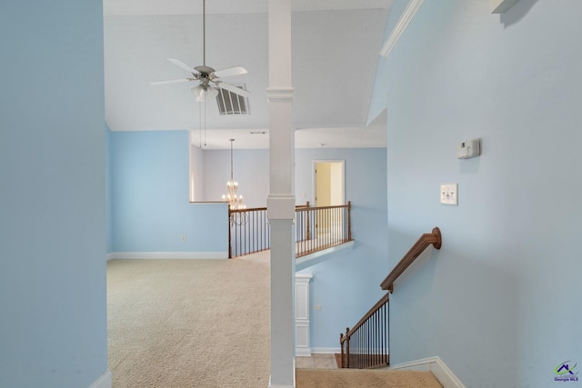 107 Rachael Ln, Warner Robins, GA 31088 - staircase with a chandelier, ceiling fan, and carpet