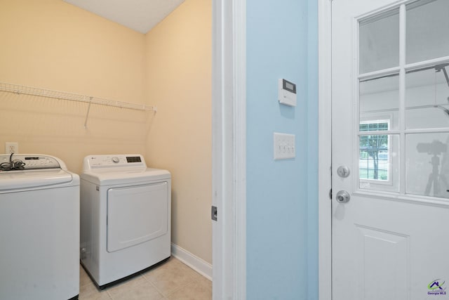 107 Rachael Ln, Warner Robins, GA 31088 - laundry area featuring independent washer and dryer and light tile patterned flooring