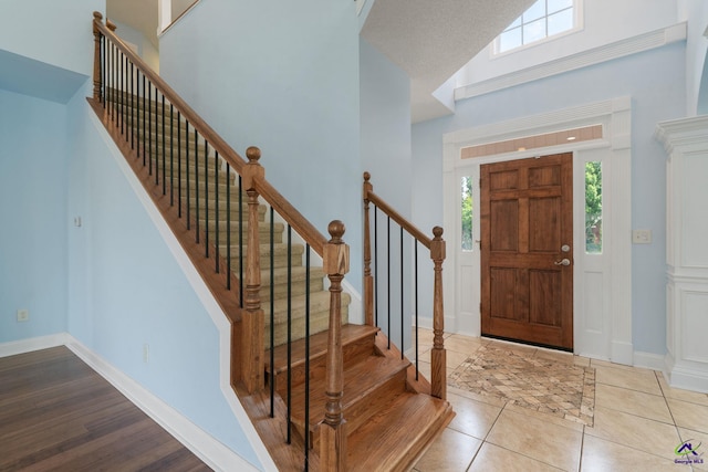 107 Rachael Ln, Warner Robins, GA 31088 - tiled foyer featuring healthy amount of natural light and stairs