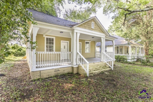138 Comer Ter, Macon, GA 31204 - view of front of home featuring a porch, roof with shingles, and crawl space