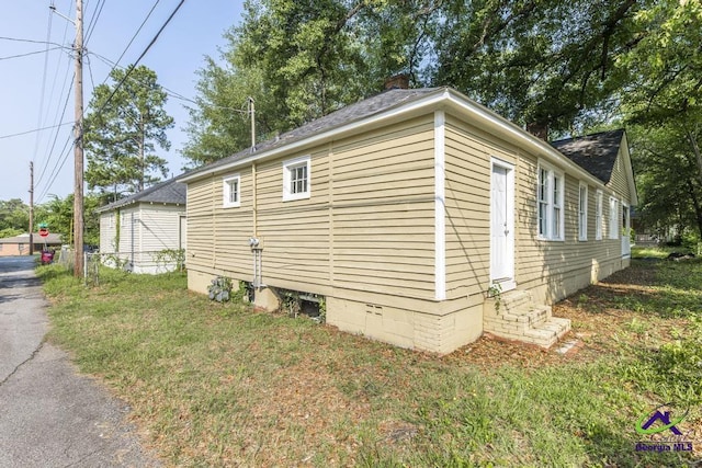 138 Comer Ter, Macon, GA 31204 - view of home's exterior featuring a chimney