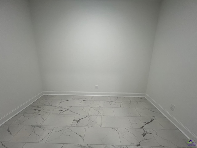 508 Nandina Ct, Warner Robins, GA 31088 - spare room featuring baseboards and marble look tile flooring