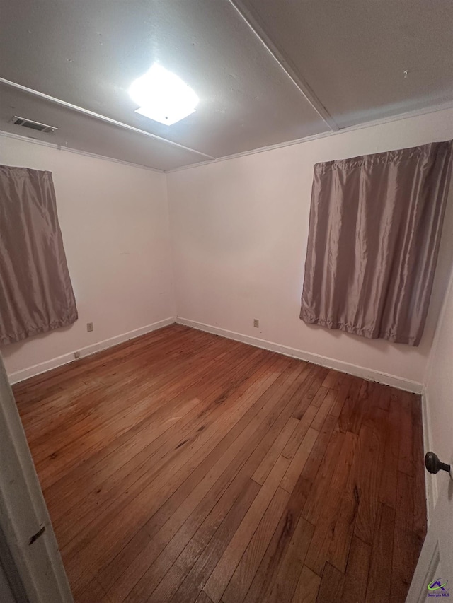 715 Miller Dr, Warner Robins, GA 31093 - empty room with hardwood / wood-style floors and baseboards