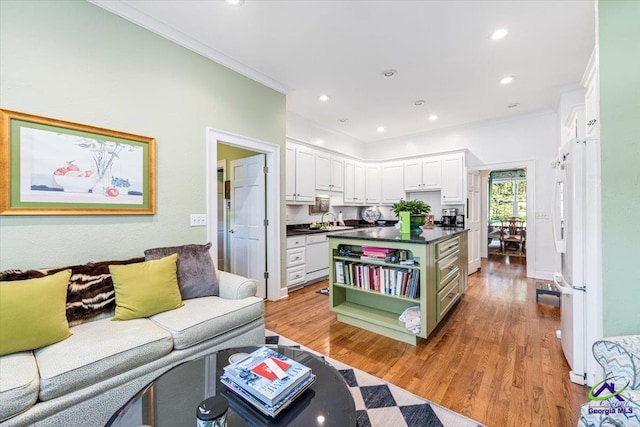 116 Maimont Cir, Macon, GA 31210 - living room featuring ornamental molding, wood finished floors, and recessed lighting