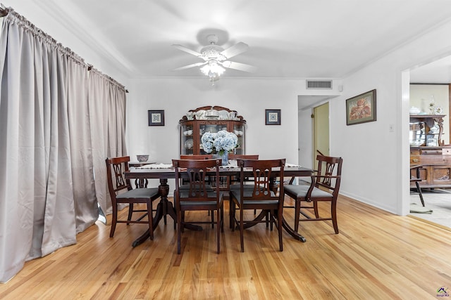 518 College St, Montezuma, GA 31063 - dining area with a ceiling fan, light wood-style floors, and ornamental molding