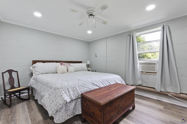518 College St, Montezuma, GA 31063 - bedroom featuring ornamental molding, wood finished floors, a ceiling fan, concrete block wall, and recessed lighting
