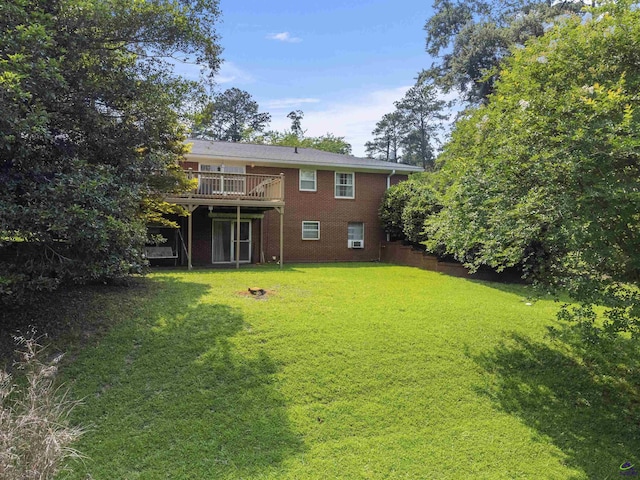 518 College St, Montezuma, GA 31063 - back of property featuring a deck, a yard, and brick siding
