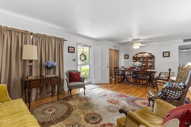 518 College St, Montezuma, GA 31063 - living room featuring a ceiling fan and wood finished floors
