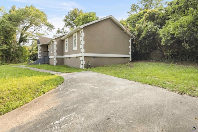 2105 Mutual Ave, Macon, GA 31204 - view of property exterior featuring a yard
