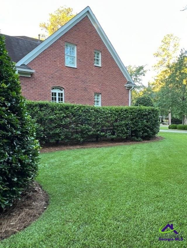 113 Troon Way, Macon, GA 31210 - view of side of home featuring a lawn and brick siding