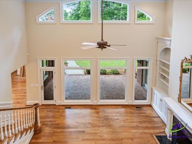 113 Troon Way, Macon, GA 31210 - entryway featuring light wood-style floors, ceiling fan, and a towering ceiling