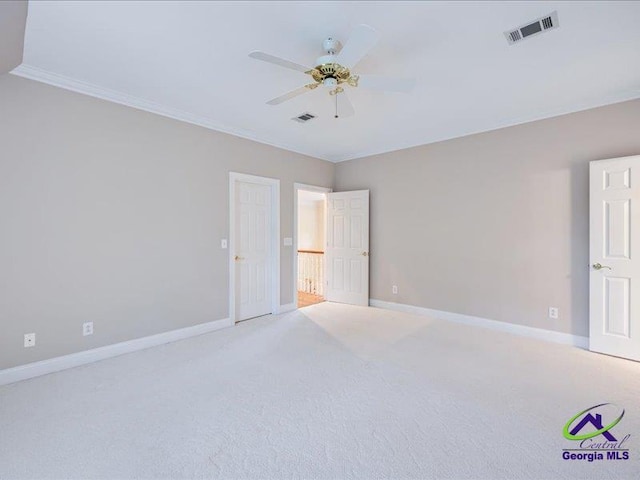 113 Troon Way, Macon, GA 31210 - unfurnished bedroom with carpet floors, baseboards, crown molding, and a ceiling fan