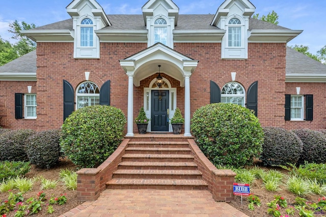 113 Troon Way, Macon, GA 31210 - colonial-style house with a shingled roof and brick siding