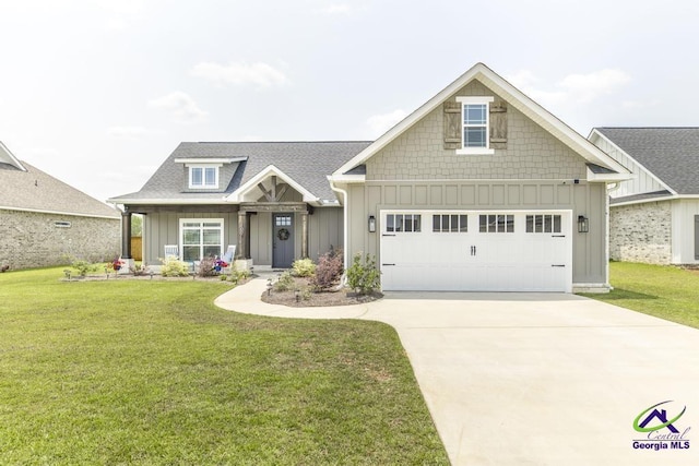 107 Field View Ln, Kathleen, GA 31047 - craftsman-style house featuring board and batten siding, a front lawn, concrete driveway, and an attached garage