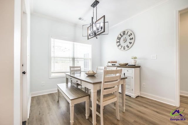 107 Field View Ln, Kathleen, GA 31047 - dining area with a chandelier, ornamental molding, light wood-type flooring, and baseboards