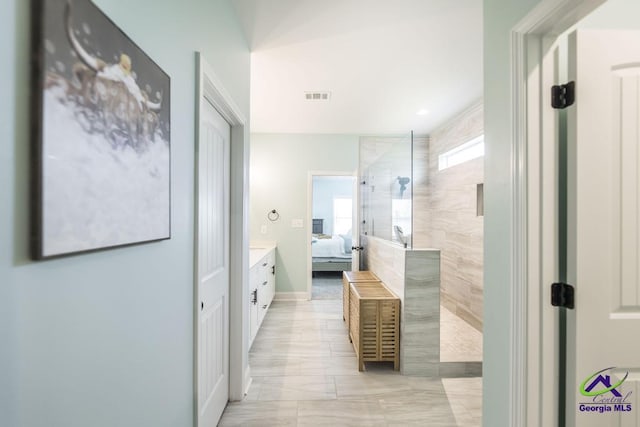 107 Field View Ln, Kathleen, GA 31047 - ensuite bathroom with a walk in shower, vanity, and marble finish flooring
