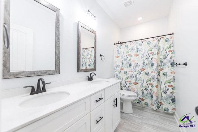 107 Field View Ln, Kathleen, GA 31047 - full bath with double vanity, toilet, and curtained shower