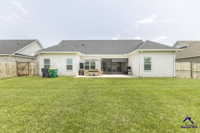 107 Field View Ln, Kathleen, GA 31047 - rear view of house featuring a patio area, brick siding, and roof with shingles