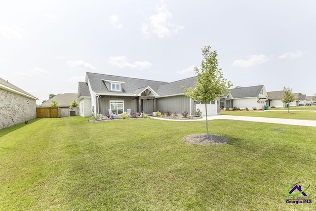 107 Field View Ln, Kathleen, GA 31047 - view of front of property featuring concrete driveway, an attached garage, cooling unit, and roof with shingles