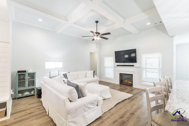 107 Field View Ln, Kathleen, GA 31047 - living room with healthy amount of natural light, beamed ceiling, a ceiling fan, wood finished floors, and coffered ceiling